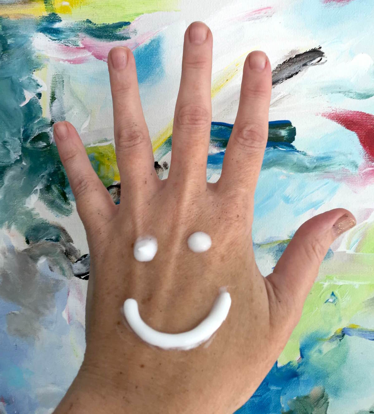 hand with smiley face