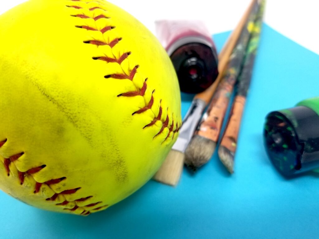 Baseball and paintbrushes