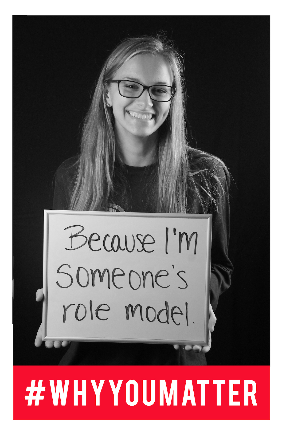 image of student holding sign 'because I'm someone's role model.'