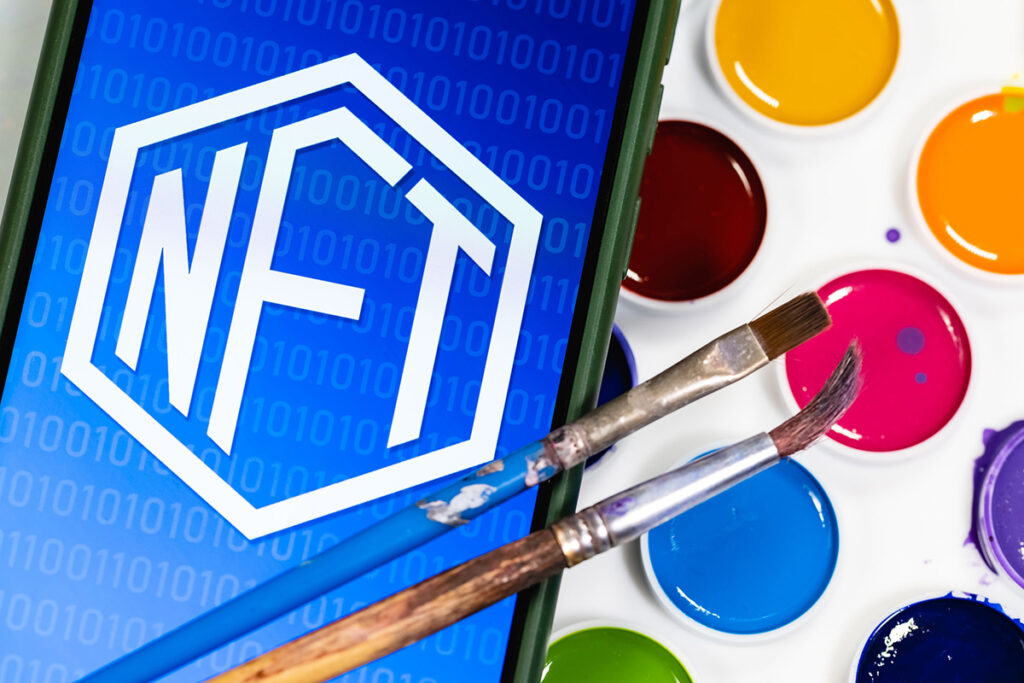 nft logo with watercolor palette and brush