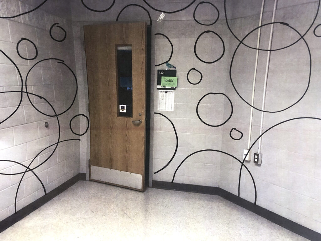 hallway photo with circles drawn on walls