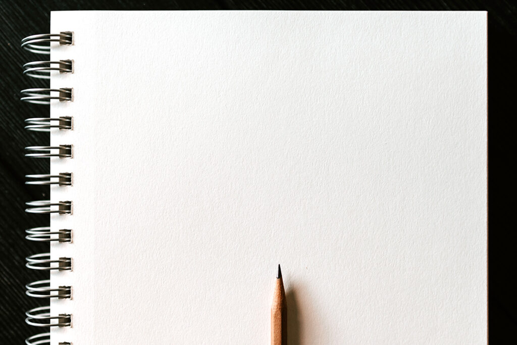 blank sketchbook with pencil