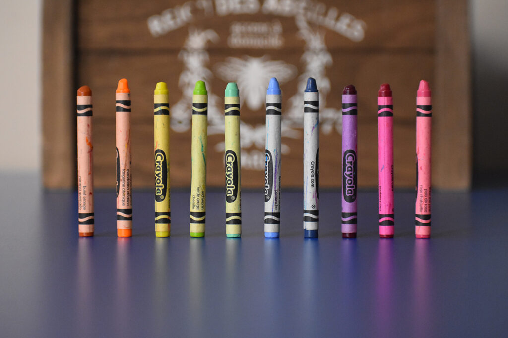 crayons lined up on table