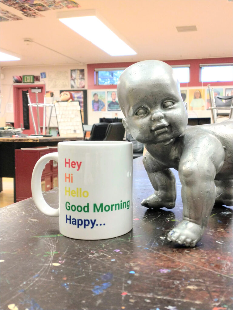 mug and sculpture