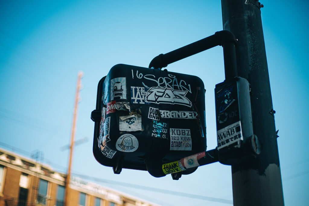 stickers on traffic pole