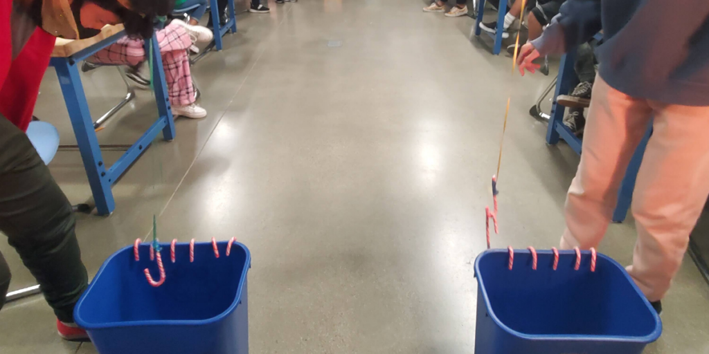 students playing candy cane game