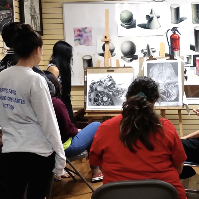 students looking at art